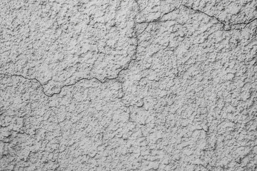 cracked plaster grey colour on the wall