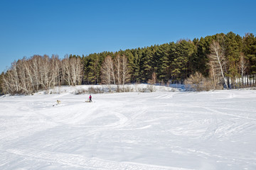 Winter landscape on the river. Siberia, Russia