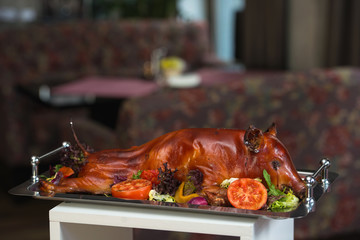 roasted suckling pig with vegetables