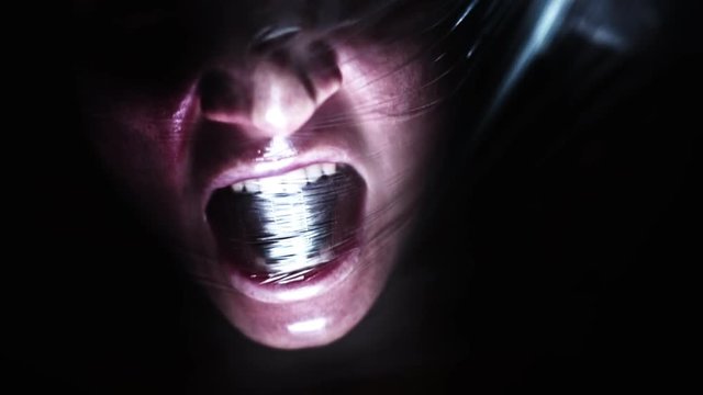4K Horror Woman Choking and Hands Breaking Plastic Bag
