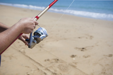 Folding the fishing line on the beach