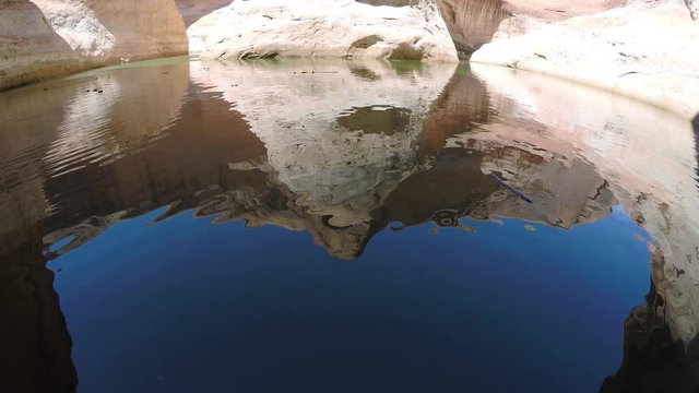Upwards pan of Canyon in Lake Powell