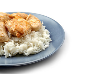 Chicken and rice on plate isolated on white