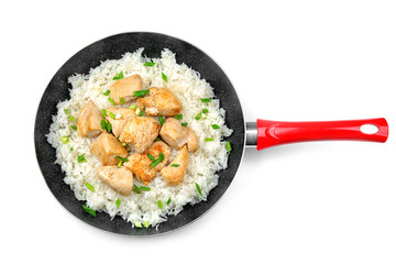 Frying pan with chicken and rice on white background