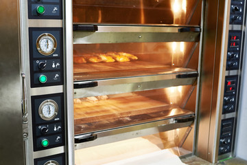 Oven with bread in bakery