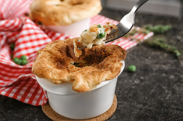 Delicious chicken pot pie on kitchen table