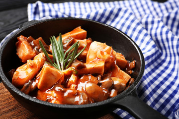Frying pan with chicken cacciatore, closeup