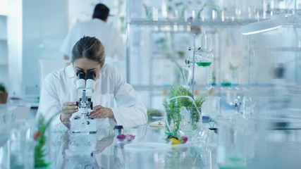 Portrait smiling research scientist working in laboratory - Powered by Adobe