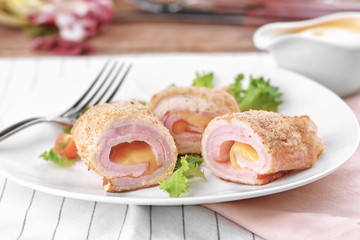Plate with tasty chicken sliced roll, closeup