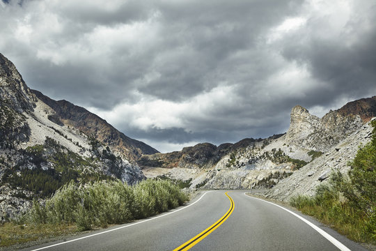 USA, California, Sierra Nevada, Winding road between mountains