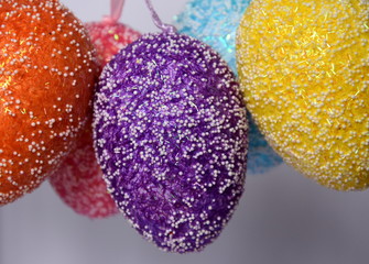 Bunch of colourful panted plastic easter eggs with white dots. Easter (Paschal) eggs are decorated eggs that are usually used as gifts on the occasion of Easter or springtime celebration.
