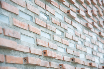 glass with  red old brick wall background
