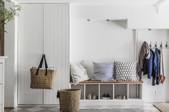 Sweden, Entrance hall with white furniture