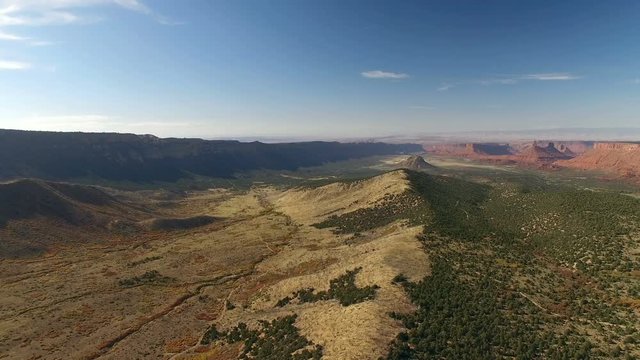 Drone backing away from valley in Moab