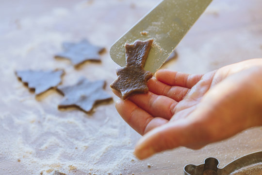 Finland, Woman baking christmas cookies