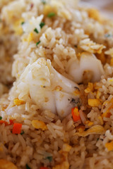 close-up Asian Chinese Fried cooked Rice with shrimp, Vegetable and Egg at street food restaurant in Thailand