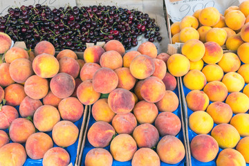 Peaches and cherries for sale at a market in Palermo, Sicily