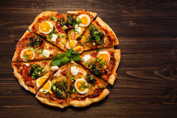 Pizza with egg and pepperoni