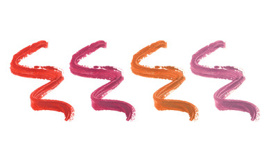 Collection of smudged lipsticks isolated on white