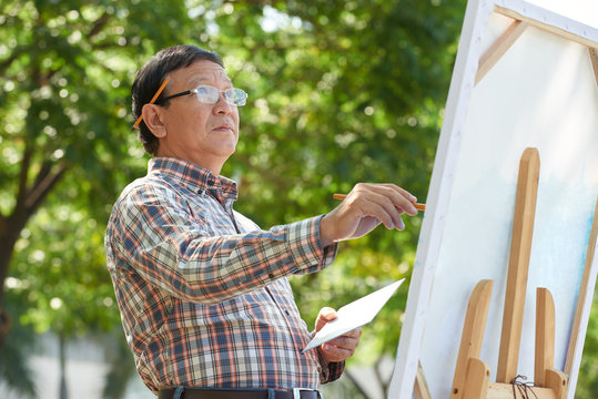 Middle-aged painter - Powered by Adobe