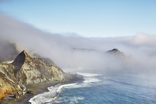 USA, California, Cliffs hidden behind fog