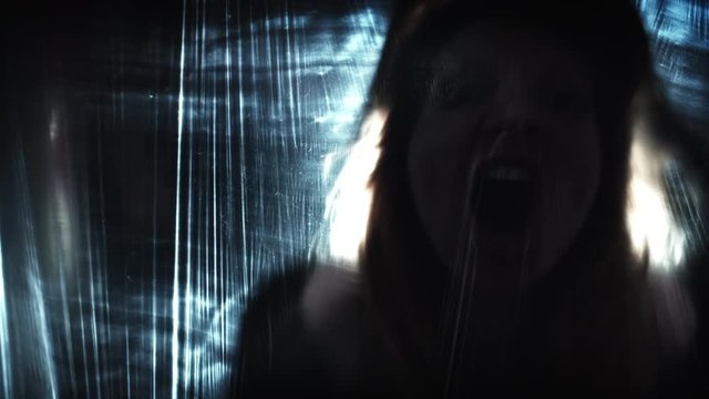 4K Horror Shot Of Creature Hands on Plastic Curtain