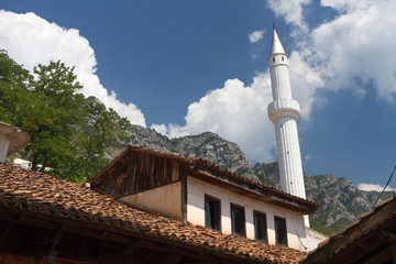 The minaret in Kruja, Albania against blue sky
