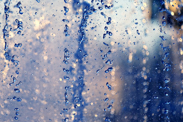 drops blue water of the fountain