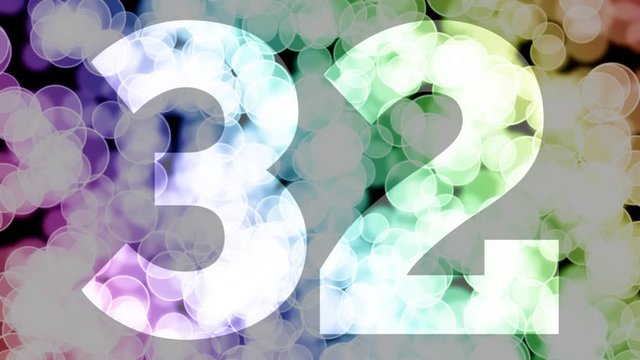 Thirty two to thirty three years birthday fade in/out animation with color gradient moving bokeh background. Animation: 90 frames still with number, 180 fade out, 30 clear, 180 fade in, 300 still.