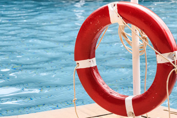 Close up of red life ring at the pool