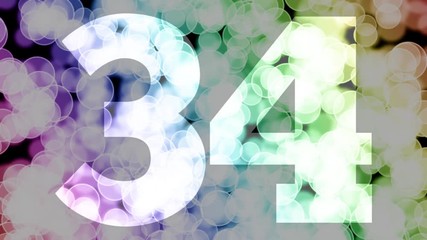 Thirty four to thirty five years birthday fade in/out animation with color gradient moving bokeh background. Animation: 90 frames still with number, 180 fade out, 30 clear, 180 fade in, 300 still.