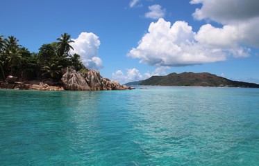 St. Pierre Island close Praslin Island, Seychelles / Beautiful scenery with blue Indian Ocean and red granite rocks.