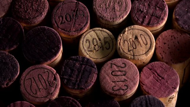 Background of used wine corks. Wall of many different wine corks. Closeup of wine corks.