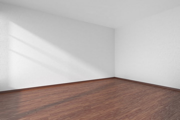 Empty room with dark parquet floor and textured white walls