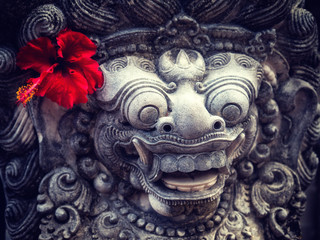 Ancient Balinese statue at the temple in Bali