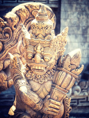 Stone sculpture on entrance door of a temple