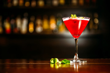 Strawberry Daiquiri cocktail on a bar counter in a night club