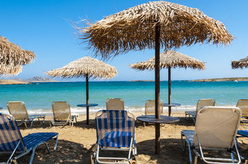 Loungers on the beach of Paros Island