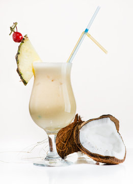 Exotic cocktails with ingredients on a light background