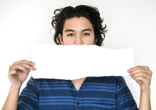 A guy with a placard in a shoot