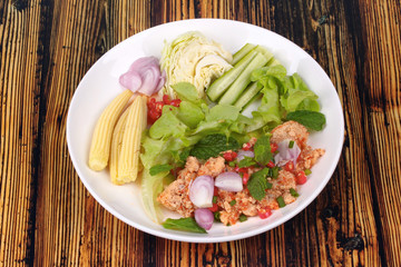 Spicy sour carp eggs of silver barb fish salad