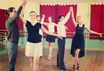 Happy people dancing waltz