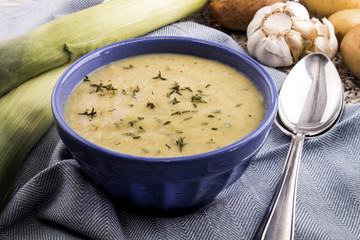 scottish leek and potato soup in a blue bowl