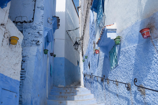 Beautiful Alley with Flowerpots in the Medina of Chefchaouen
