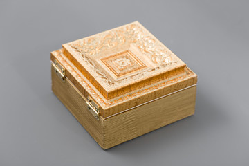 Beautiful simple hand-made boxes on a gray background