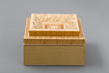 Beautiful simple hand-made boxes on a gray background