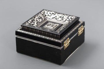 Beautiful simple hand-made boxes on a gray background