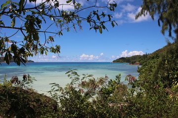 Fototapeta na wymiar Anse Takamaka, Praslin Island, Seychelles, Indian Ocean, Africa / View to Curieuse Island.