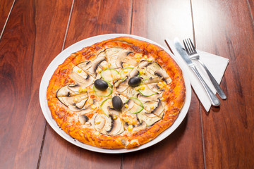Top view of vegetable restaurant pizza