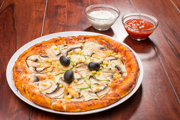 Top view of vegetable restaurant pizza